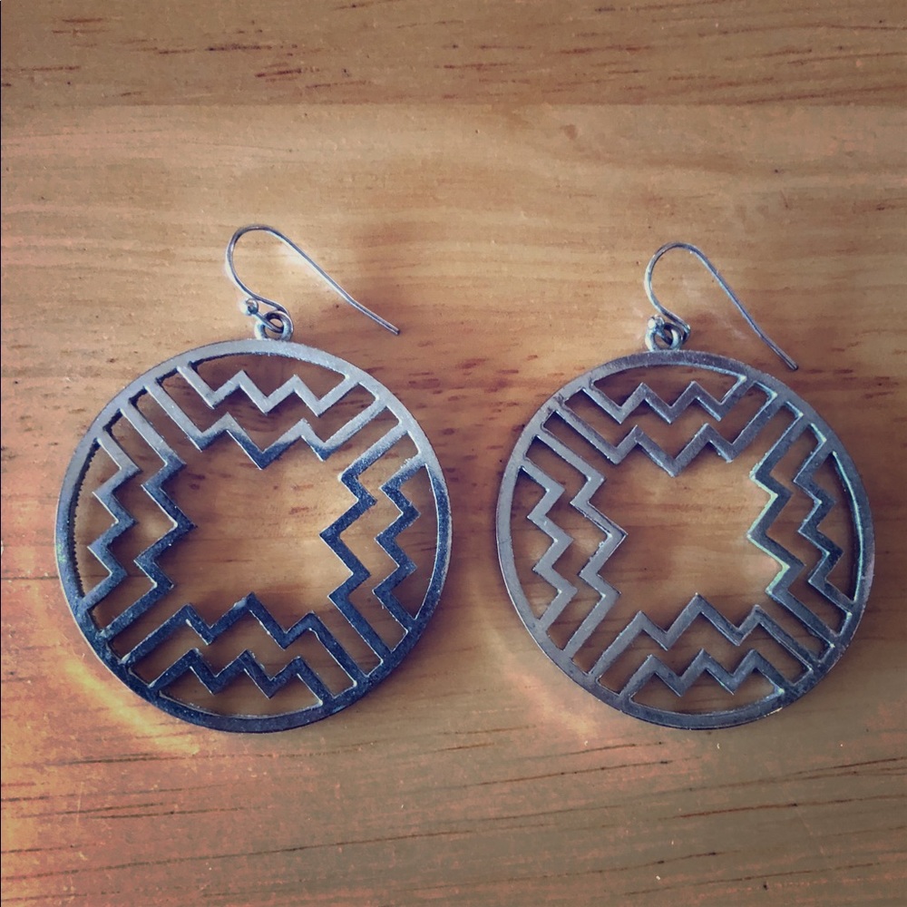 Silver colored earrings